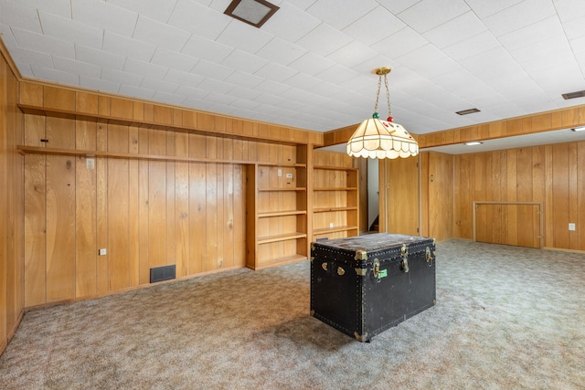 118 S Clarendon Ave, Addison, IL 60101 - carpeted spare room featuring wooden walls