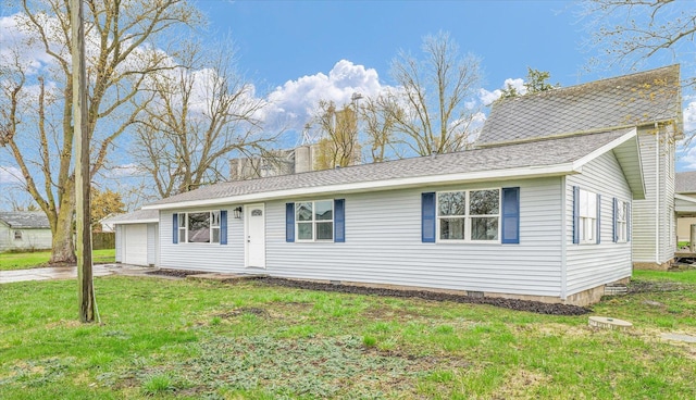single story home with roof with shingles and a front lawn