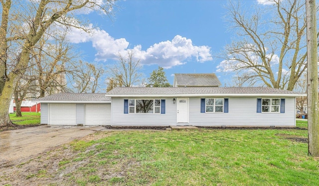 view of front of house with a front yard, roof with shingles, driveway, and crawl space