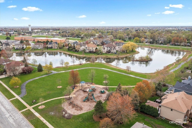 aerial view with a residential view and a water view