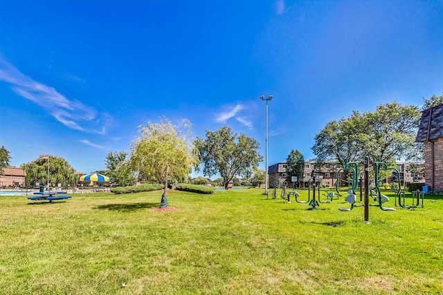 view of home's community featuring a yard