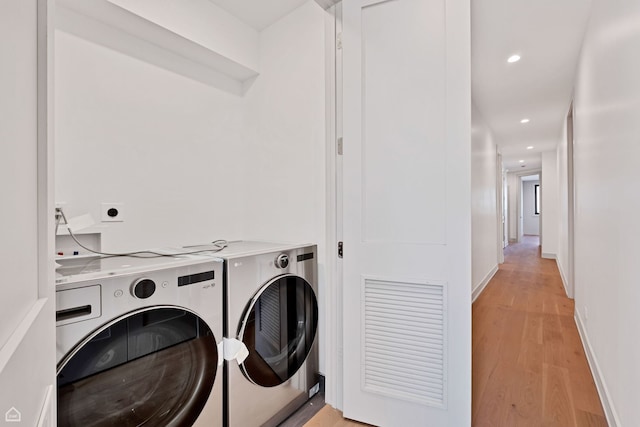 1646 N Orchard St Unit 3S, Chicago, IL 60614 - laundry area with washer and dryer, light wood-type flooring, recessed lighting, and baseboards