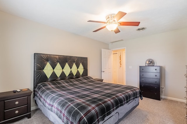 bedroom with light colored carpet, visible vents, ceiling fan, and baseboards