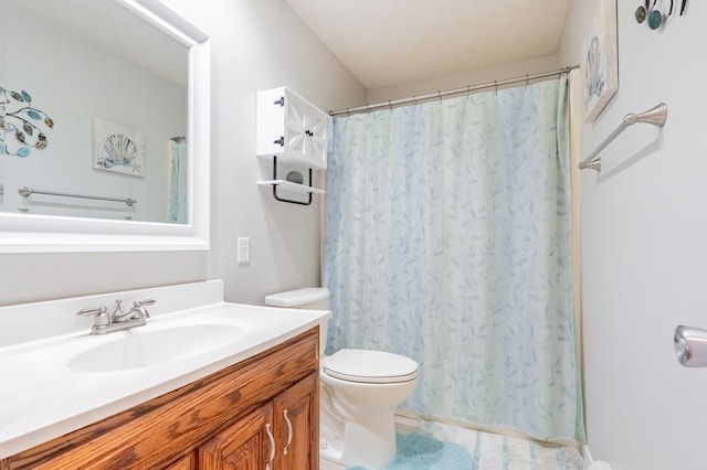 full bathroom with curtained shower, toilet, and vanity