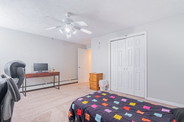 exercise area with ceiling fan, baseboards, and carpet flooring