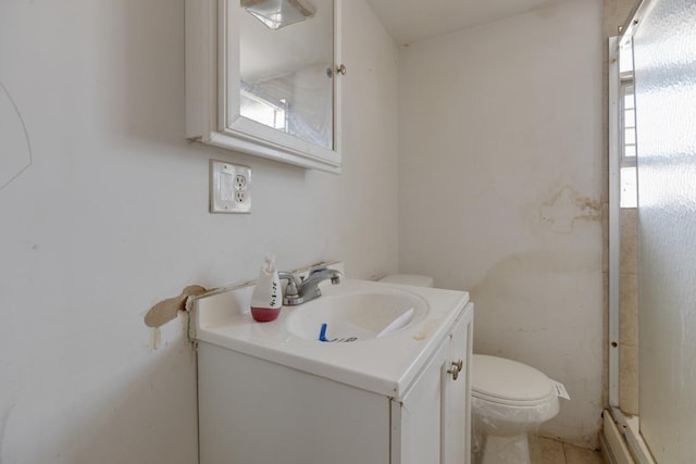 bathroom with toilet and vanity