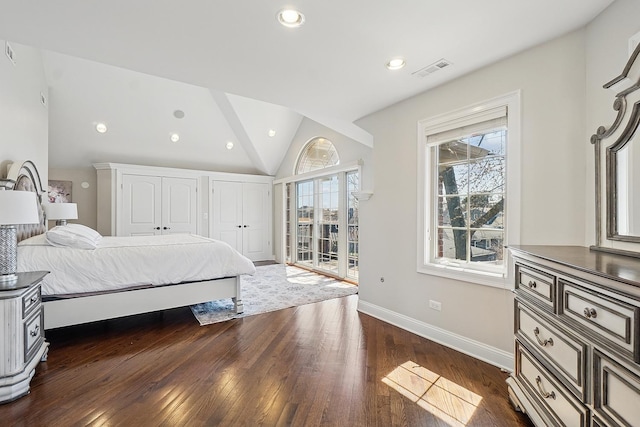 bedroom featuring multiple closets, visible vents, baseboards, dark wood-type flooring, and lofted ceiling