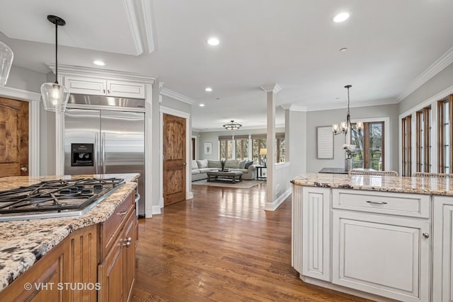 kitchen with dark wood-style flooring, baseboards, recessed lighting, white cabinetry, and appliances with stainless steel finishes