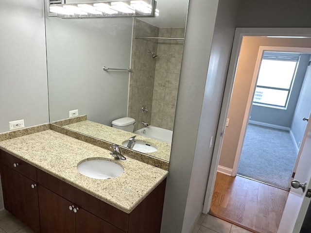 474 N Lake Shore Dr Unit 6102, Chicago, IL 60611 - bathroom featuring toilet, tile patterned floors, vanity, and baseboards