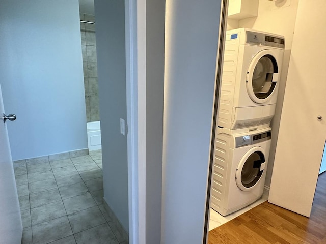 474 N Lake Shore Dr Unit 6102, Chicago, IL 60611 - laundry area featuring stacked washer / dryer and wood finished floors