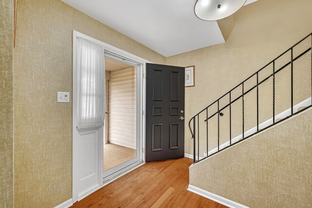 6650 Powell St, Downers Grove, IL 60516 - entryway with wood finished floors and stairs