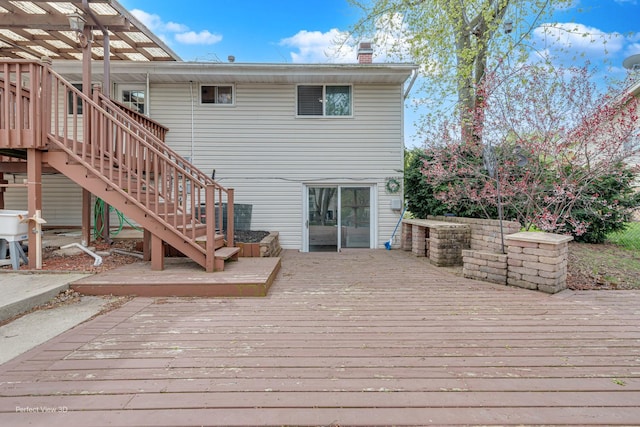 deck featuring stairway