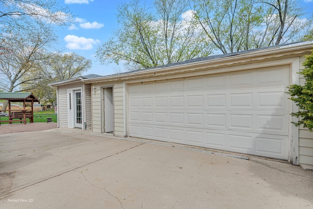 garage featuring driveway