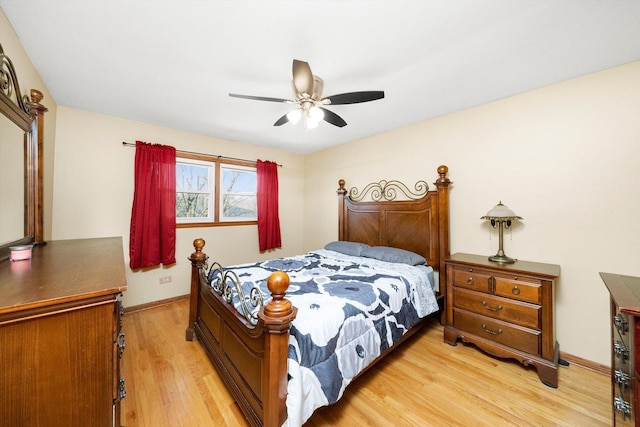 609 Chippewa Ln, Darien, IL 60561 - bedroom with baseboards, ceiling fan, and light wood-style floors