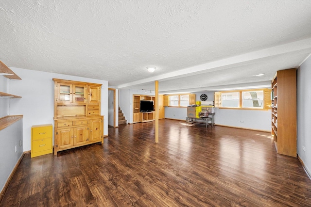 609 Chippewa Ln, Darien, IL 60561 - unfurnished living room with baseboards, a textured ceiling, stairs, and dark wood finished floors