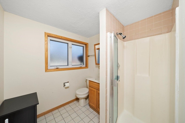 609 Chippewa Ln, Darien, IL 60561 - full bathroom featuring a shower stall, vanity, a textured ceiling, and toilet