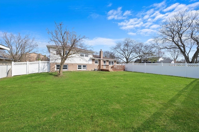609 Chippewa Ln, Darien, IL 60561 - view of yard featuring a fenced backyard and a wooden deck
