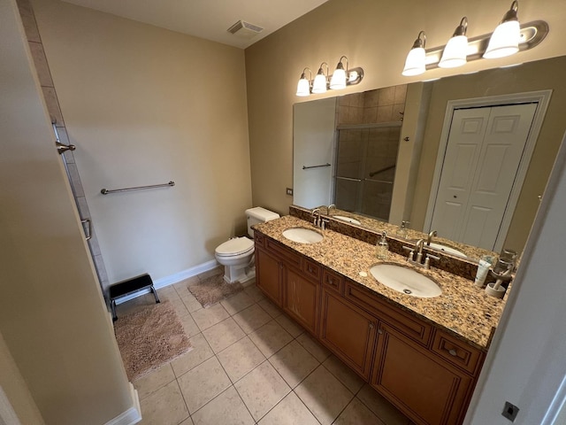 140 S River St Unit 409, Aurora, IL 60506 - bathroom with a shower stall, tile patterned floors, visible vents, and a sink
