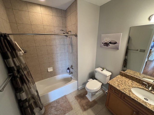 140 S River St Unit 409, Aurora, IL 60506 - full bath featuring shower / tub combo, vanity, baseboards, tile patterned flooring, and toilet