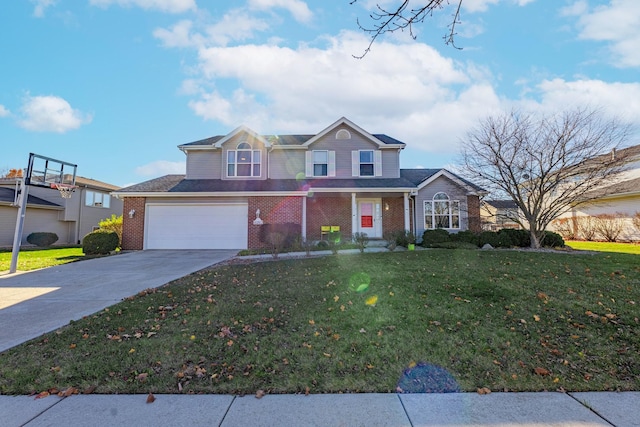 traditional-style house with concrete driveway, a garage, a front lawn, and brick siding