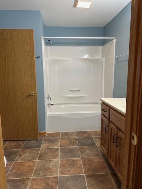 110 E Spring Rd, Coal City, IL 60416 - bathroom featuring stone finish flooring, vanity, and  shower combination