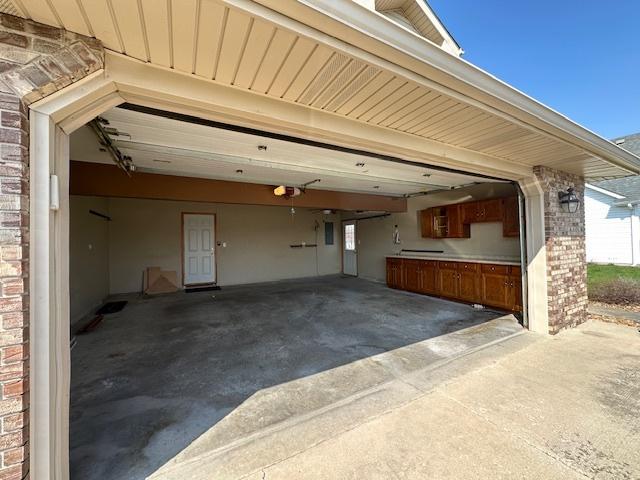 110 E Spring Rd, Coal City, IL 60416 - garage with driveway and a garage door opener