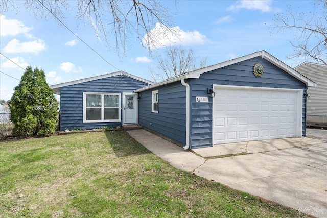 ranch-style home with a garage and a front lawn