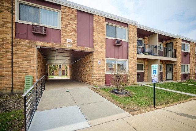 212A Collen Dr Unit 104, Lombard, IL 60148 - view of property featuring a wall unit AC
