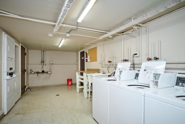 212A Collen Dr Unit 104, Lombard, IL 60148 - common laundry area with light floors, a sink, stacked washer / drying machine, and washer and clothes dryer