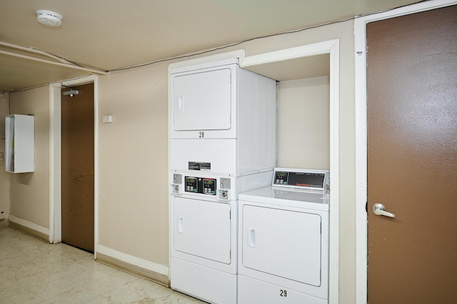212A Collen Dr Unit 104, Lombard, IL 60148 - shared laundry area with stacked washer / dryer and baseboards