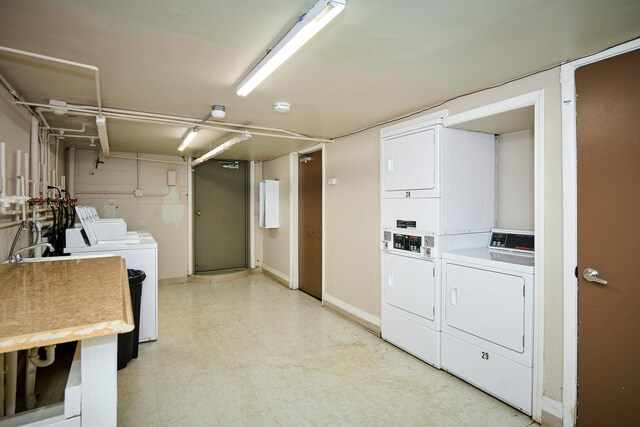 212A Collen Dr Unit 104, Lombard, IL 60148 - common laundry area with stacked washer / dryer, washer and clothes dryer, and light floors