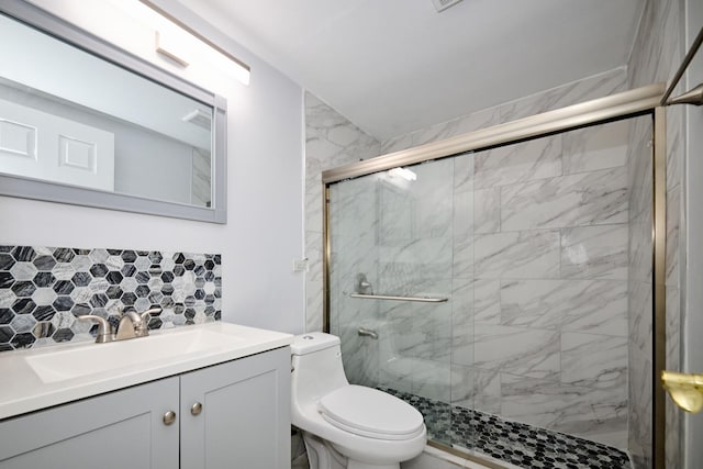 212A Collen Dr Unit 104, Lombard, IL 60148 - bathroom with a shower stall, tasteful backsplash, vanity, and toilet