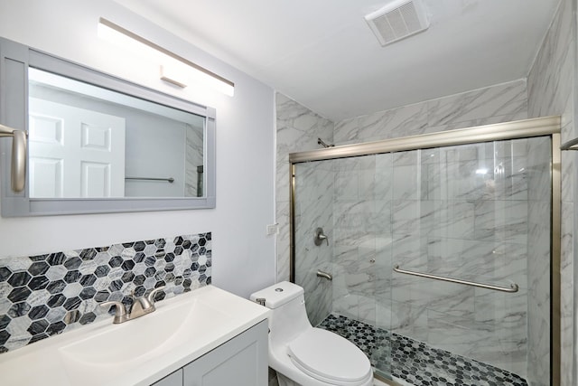 212A Collen Dr Unit 104, Lombard, IL 60148 - bathroom featuring tasteful backsplash, vanity, visible vents, toilet, and a marble finish shower