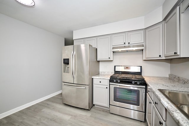 212A Collen Dr Unit 104, Lombard, IL 60148 - kitchen with light wood-type flooring, under cabinet range hood, a sink, stainless steel appliances, and gray cabinetry
