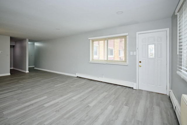 212A Collen Dr Unit 104, Lombard, IL 60148 - interior space with baseboards, a baseboard heating unit, and wood finished floors