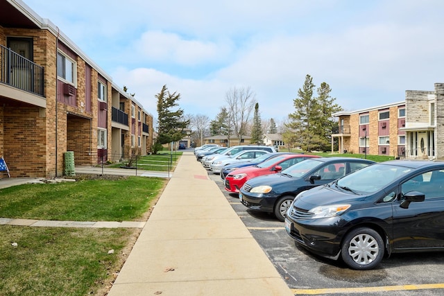 212A Collen Dr Unit 104, Lombard, IL 60148 - uncovered parking lot featuring a residential view