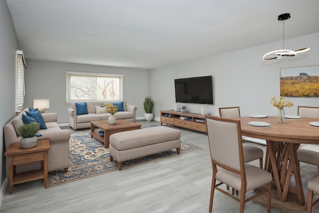 212A Collen Dr Unit 104, Lombard, IL 60148 - living area with light wood finished floors and an inviting chandelier