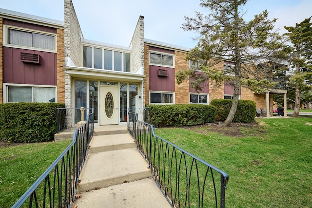 212A Collen Dr Unit 104, Lombard, IL 60148 - view of front facade with a front lawn