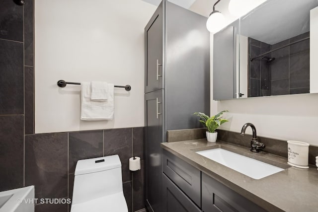 2400 N Lakeview Ave Unit 901, Chicago, IL 60614 - full bathroom with a shower, vanity, tile walls, and toilet