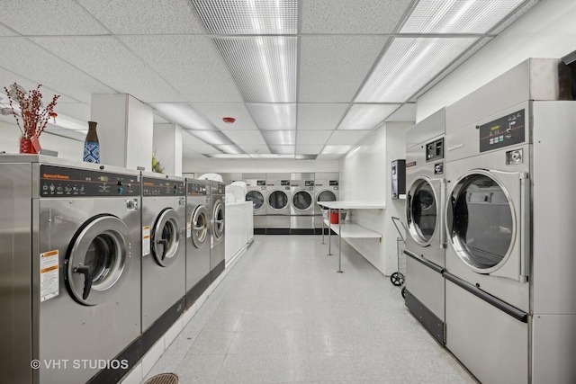 2400 N Lakeview Ave Unit 901, Chicago, IL 60614 - community laundry room with tile patterned floors and washing machine and dryer