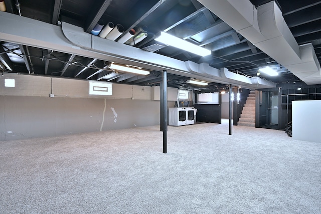 5628 S Merrimac Ave, Chicago, IL 60638 - basement with healthy amount of natural light, stairs, carpet floors, and separate washer and dryer