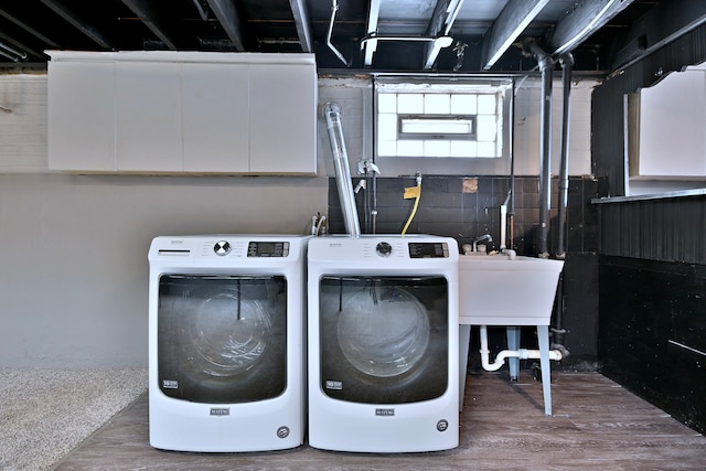 5628 S Merrimac Ave, Chicago, IL 60638 - washroom with washing machine and clothes dryer and wood finished floors