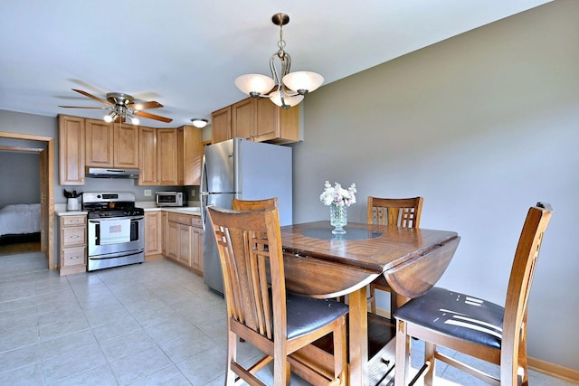 5628 S Merrimac Ave, Chicago, IL 60638 - dining room with a ceiling fan and light tile patterned floors
