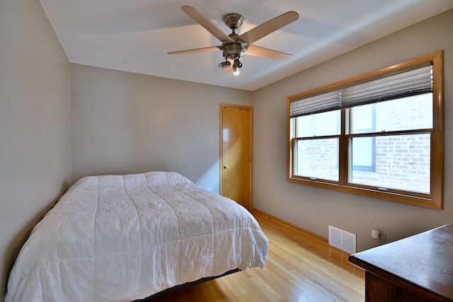 5628 S Merrimac Ave, Chicago, IL 60638 - bedroom featuring wood finished floors and ceiling fan