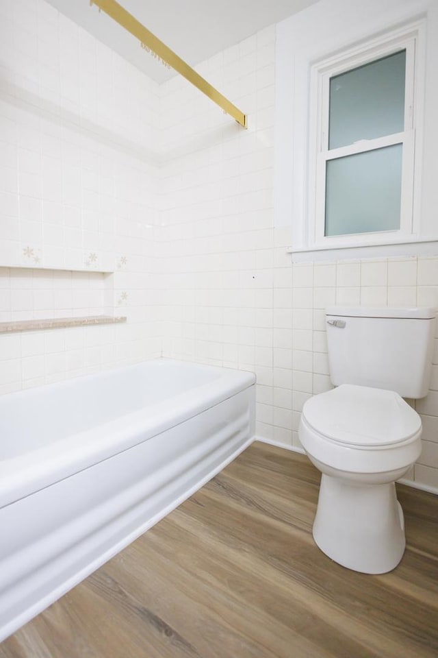 13 Park Pl, Kankakee, IL 60901 - full bath with toilet, shower / bath combination, wood finished floors, and tile walls
