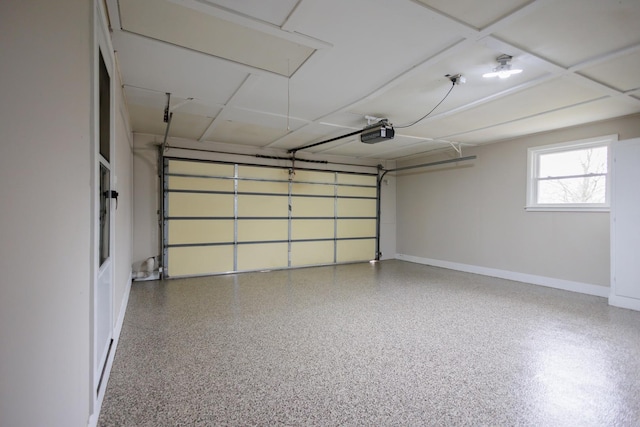 13 Park Pl, Kankakee, IL 60901 - garage with baseboards and a garage door opener