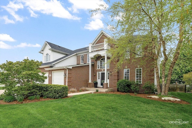 view of front of house with brick siding and a balcony
