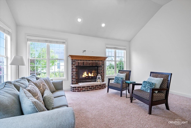 living room with lofted ceiling, carpet flooring, a brick fireplace, baseboards, and recessed lighting