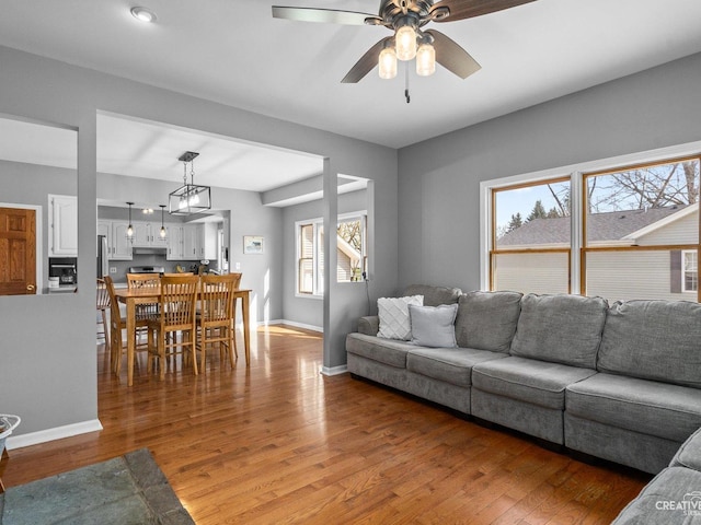 445 S Depot St, Somonauk, IL 60552 - living area featuring light wood finished floors, ceiling fan, and baseboards