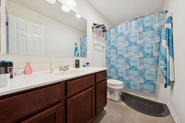 bathroom featuring tile patterned flooring, toilet, shower / bath combo, and vanity